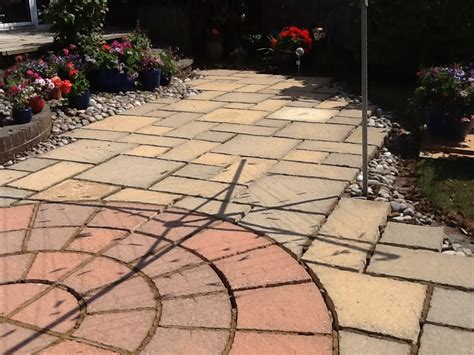 Stained and Damaged Sandstone Patio Restoration in Rushden ...