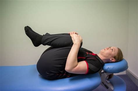 Lumbar (low back) flexion stretch - supine