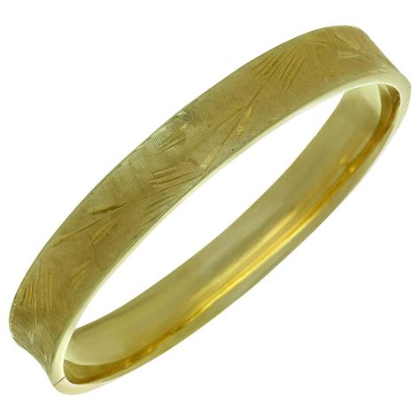 Engraved Gold Bangle Bracelet at 1stDibs