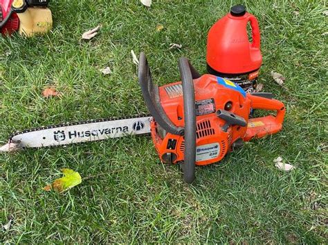 Husqvarna E series 235 chainsaw with stihl chain lubricant - byceonline.com Auctions & Real Estate