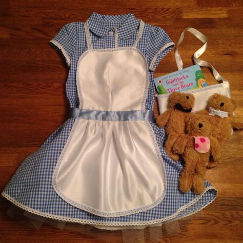 Goldilocks and the Three Bears costume for World Book Day. Hand made apron and bag. Accessorised ...