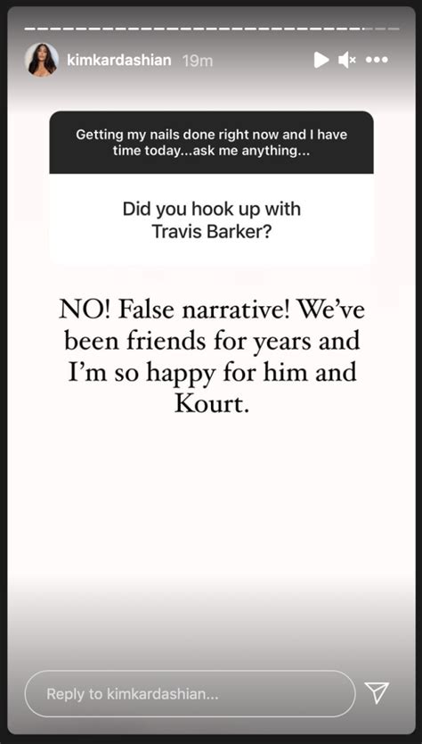 Kim Kardashian denies hooking up with Travis Barker