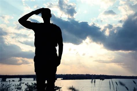 Soldiers in uniform saluting outdoors. Military service Stock Photo by ©NewAfrica 305710042