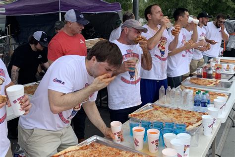 This Pizza-Eating Contest Featured Slices That Were Two Feet Long - PMQ Pizza