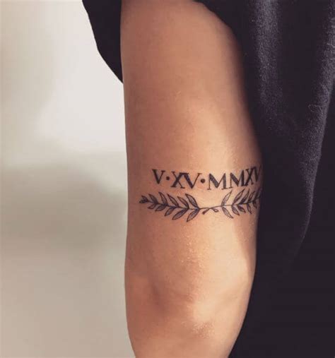 Roman Numerals Tattoo On Arm