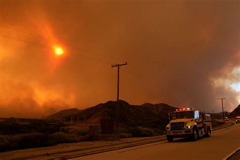 Wildfire erupts burning more than 11,000 acres near Los Angeles, mass ...