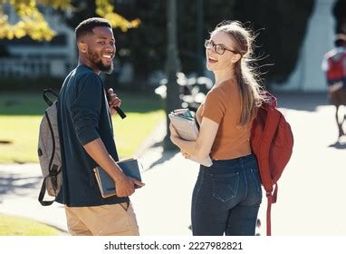 Students Couple University Friends Walking Together Stock Photo ...