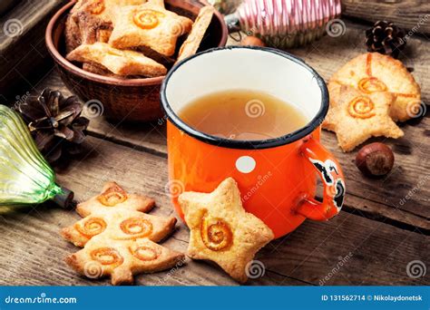 Tea and Christmas cookies stock photo. Image of dessert - 131562714