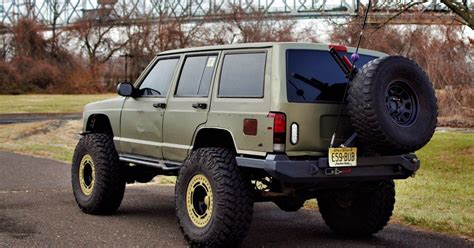 84-01 Cherokee XJ Rear Bumper w/ Swing Out Tire Carrier | Jeep xj, Jeep ...