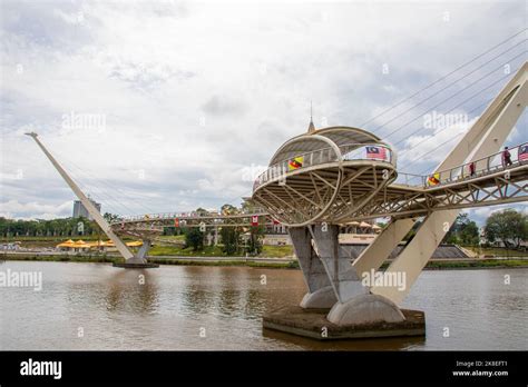 the view of Sarawak river and the view of Darul Hana Bridge in Kuching, Sarawak Malaysia. The ...