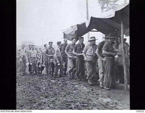 MOROTAI. 13 JUNE 1945. UNITS OF 7 DIVISION ARRIVED AT MOROTAI BY CONVOY AND LANDED AT BLUE BEACH ...