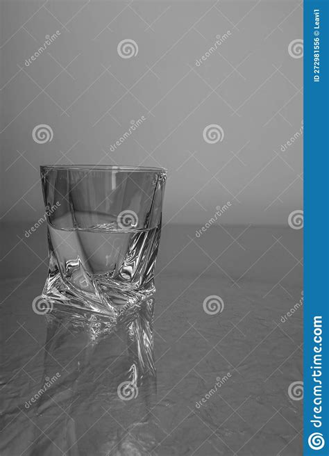 Clean Water in a Non-standard Glass Stock Photo - Image of wine, jewellery: 272981556