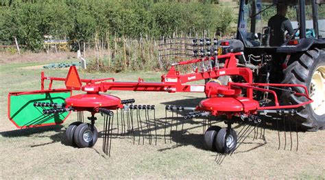 Rake/Tedder Combination - FLINNER FARMS AND IMPLEMENTS