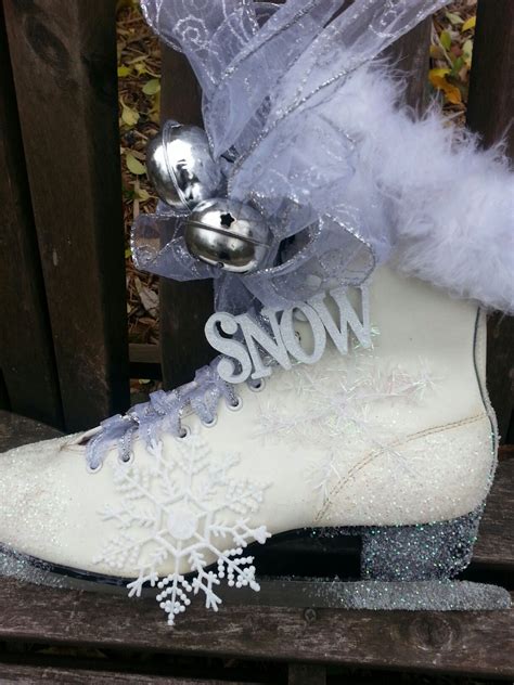 My First of SIX ice skates I am decorating for our front entry doors this winter. Between the ...