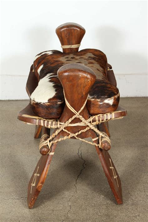 Camel Saddle Seat, Footstool with Hide Cushion at 1stDibs | camel saddle cushion, camel saddle ...