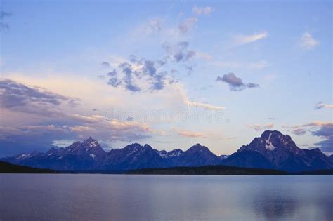 Grand Tetons at sunrise stock photo. Image of capped - 10737766