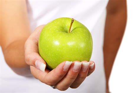 Hand Holding Green Apple. Healthy Eating Lifestyle