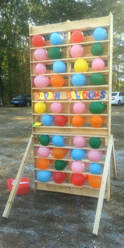 DIY Dartless Balloon Pop Game ~ Double-sized pallet & extra pallet boards. We turned the boards ...