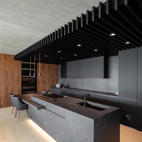 A Matte Black Kitchen Makes A Strong Statement Inside This Home