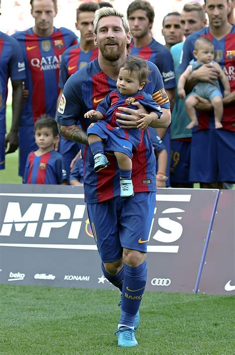 Leo Messi with his son Mateo during La Liga match between F.C ...