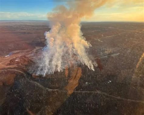 Officials hope rain, favourable winds aid fight against Fort McMurray ...