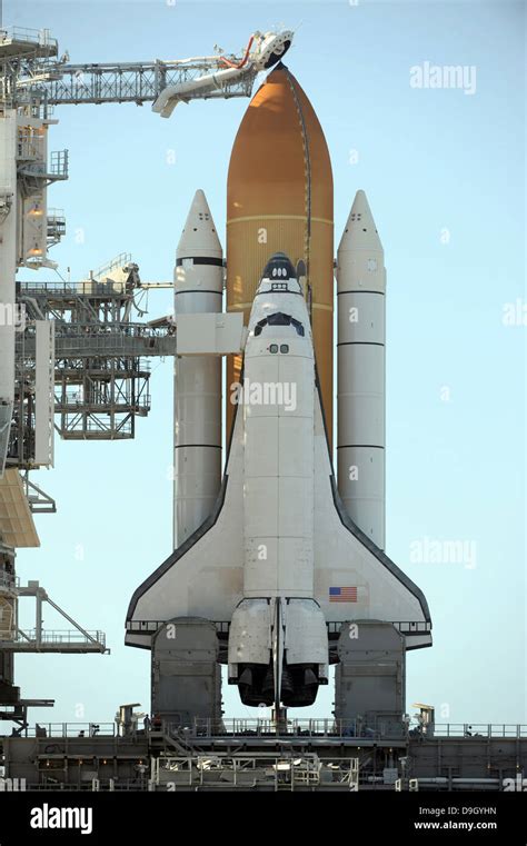 Space shuttle Atlantis sits on the launch pad at the Kennedy Space ...