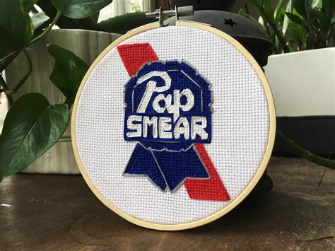 [FO] Another one of my twisted logo designs : r/CrossStitch