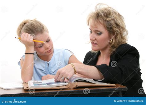 Teacher Helping Student at Desk Stock Image - Image of adolescent, eight: 233579