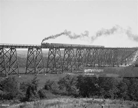 Steam locomotive & Train passes over Valley Trestle Bridge -Chicago ...