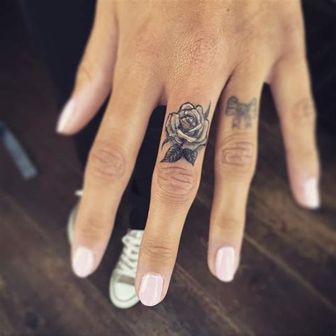 Perfect finger tat | Finger tattoos, Finger rose tattoo, Hand tattoos