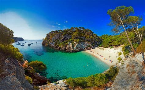 Download Tree Cliff Turquoise Ocean Boat Yacht Spain Menorca Photography Beach HD Wallpaper