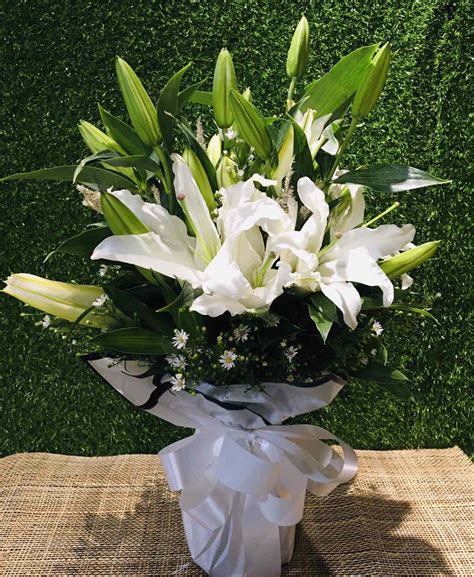 Send 3 Stem White Color Lilies Bouquet to Metro Manila Philippines