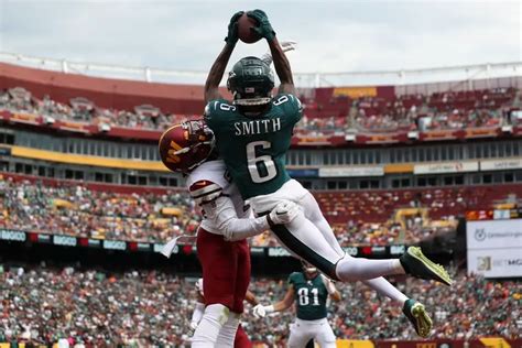 Eagles’ DeVonta Smith glides like Batman as his acrobatic catches on a career day sink the ...