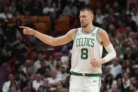 Celtics' Kristaps Porzingis sprains left ankle, leaves game against ...