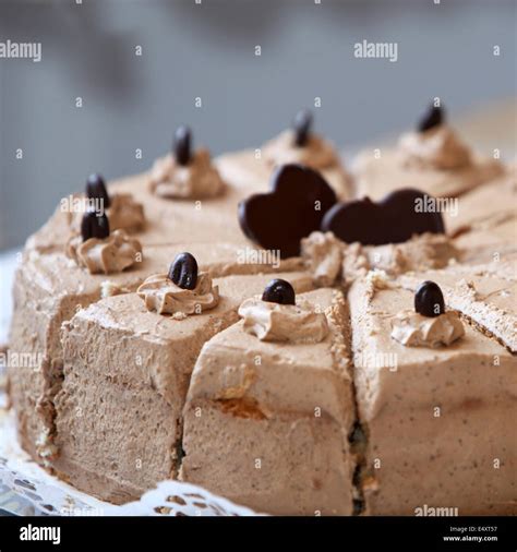 Chocolate birthday cake with heart shapes Stock Photo - Alamy