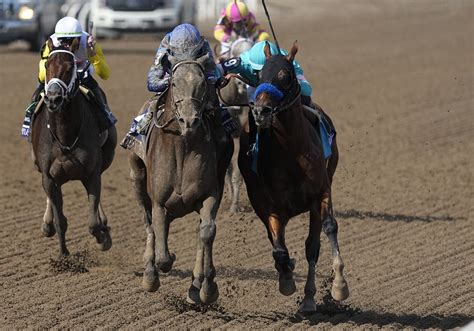 Cody's Wish ekes out a nose victory in Breeders' Cup Dirt Mile after rivals bump in the stretch ...