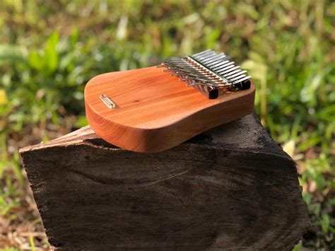 My new Kalimba with special tuning -Pelog and Slendro scale. Pelog and Slendro scale are used ...