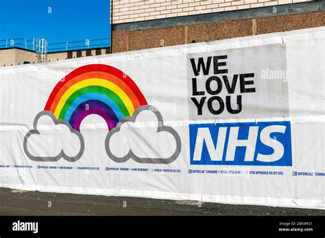 NHS rainbow banner, UK. We love you NHS sign Stock Photo - Alamy