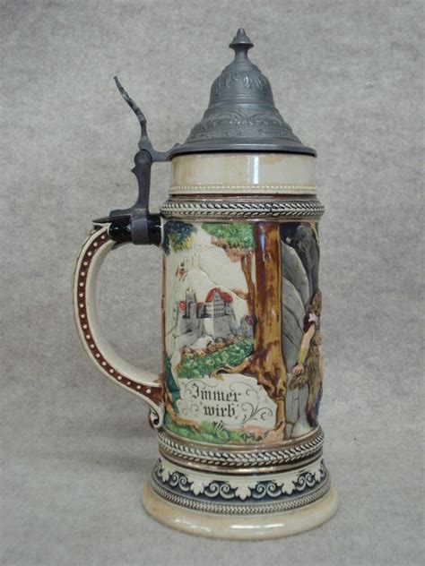 Three 1/2 liter German Beer Steins with pewter lids, one signed D.R.G.M ...