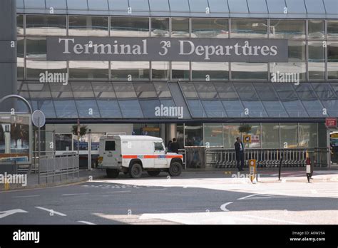 Armoured police vehicle outside Terminal 3 Departures at London Stock Photo, Royalty Free Image ...