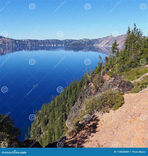 Reflections in Deep Blue Crater Lake Stock Image - Image of skies, deep ...