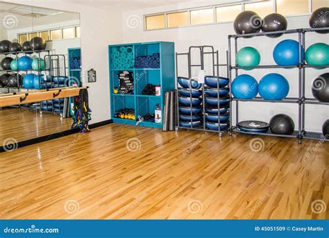 Group Exercise Room with Workout Equipment Stock Image - Image of storage, mats: 45051509