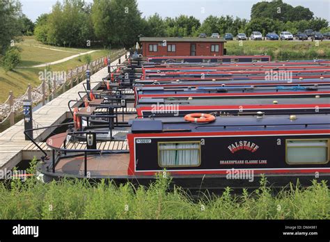 Canal boats moored at Mercia Marina, Willington, Derbyshire, one of the largest marinas in ...