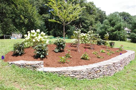 A Berm for Curb Appeal - LAND DESIGNS UNLIMITED LLC