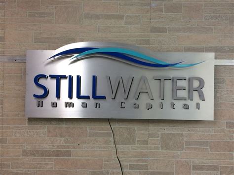 Aluminum metal signs are modern and sleek when left as the raw metal finish or powder coated in ...