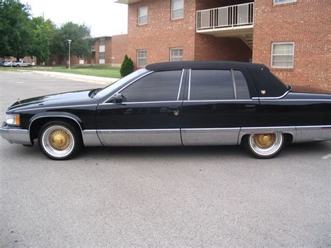 Gold plated dayton rims cadillac