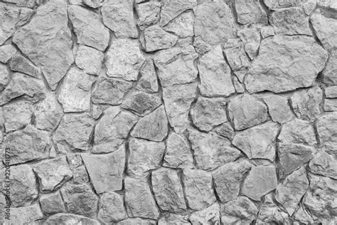 Grey stone wall texture. Ancient natural cobblestone road as background. Stock Photo | Adobe Stock