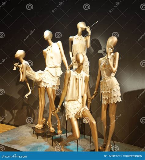 Boutique Display Window with Mannequins. Stock Photo - Image of commercial, dress: 112550176