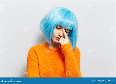 Portrait of Young Sad Girl with Blue Hair Against White Studio ...