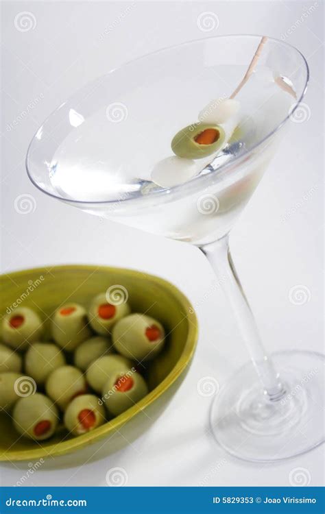 Martini and green olives stock image. Image of drink, food - 5829353